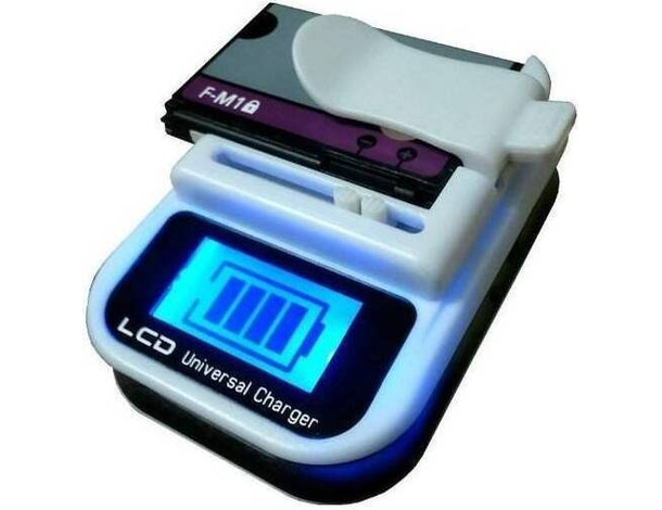 Caricabatteria Caricatore Batteria LCD Universale USB Smartphone Fotocamere...